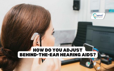 How do you adjust behind-the-ear hearing aids?